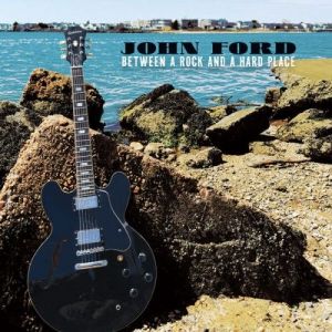 Ford John - Between A Rock And A Hard Place